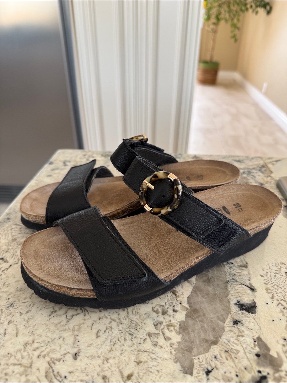 Naot Black Leather Slide Sandals with Tortoiseshell Accent Buckle